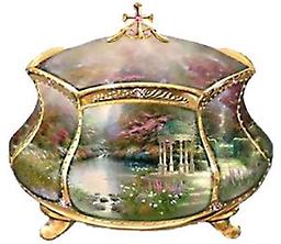 Thomas Kinkade "Garden Of Prayer" Musical Prayer Box A musical first! Crafted of Heirloom Porcelain® with 22K gold accents and features Kinkade artwork, private prayer compartment and bible verse.
Measures 3-3/4" W