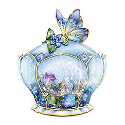 Lena Liu Porcelain Jeweled Music Box With Butterfly Handle Whispering Wings Music Box
Limited-edition Heirloom Porcelain® Lena Liu music box has sapphire-colored Swarovski crystals and butterfly lid. Plays "On the Wings of Love."
Measures 4"