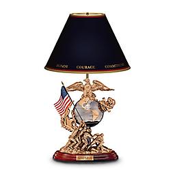 U.S. Marines "Esprit De Corps" Tabletop Lamp Sculptural lamp base features the Marine Eagle, Globe and Anchor and historic flag raising at Iwo Jima. Inscribed Marines Blue shade and more.
Measures 15" H