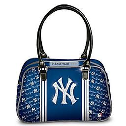Designer-Style New York Yankees "City Chic" Handbag Stylish handbag shows New York Yankees¿ pride with sparkling logo, custom print showcasing team name and leather handles.
Measures 13" W x 8" H x 5" D; drop measures 7-1/2"