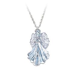 Inspiring Guardian Angel Crystal Pendant For Granddaughter Handcrafted crystal guardian angel pendant refracts light, genuine platinum accents, sterling silver bail, chain. Gift box and sentiment card.