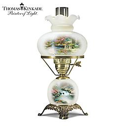 Thomas Kinkade Frosted Glass Hurricane Lamp With 2 Artworks A FIRST! Frosted glass hurricane lamp with Thomas Kinkade artwork, 3 lighting options, handcrafted base, butterfly key and more. Limited edition.
Measures 17" H x 8" in diameter