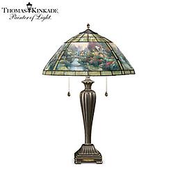 Thomas Kinkade's "Lamplight Bridge" Stained-Glass Table Lamp Thomas Kinkade Lamplight Bridge Table Lamp
Impressive limited-edition home décor! Stunning shade features handcrafted glazier's leading. Classically styled, bronze-finished base.