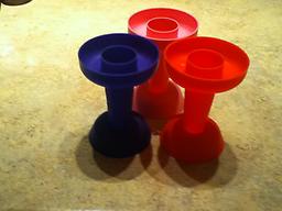 Dripstik set of three Dripstik .Dripstik holds popsicles , ice cream. As the frozen desserts begin to melt away, it collects and contains all the drippings.